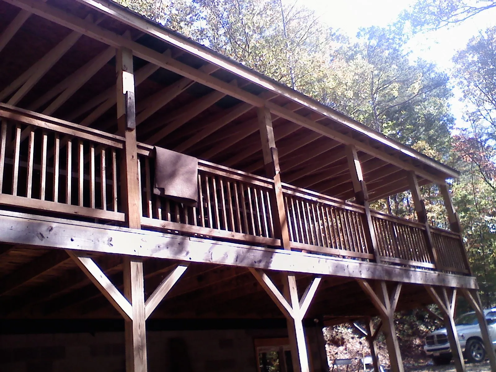 Timber framing under a new elevated porch and deck — Roof Leak Repair in South Royalton by Roofing Brothers